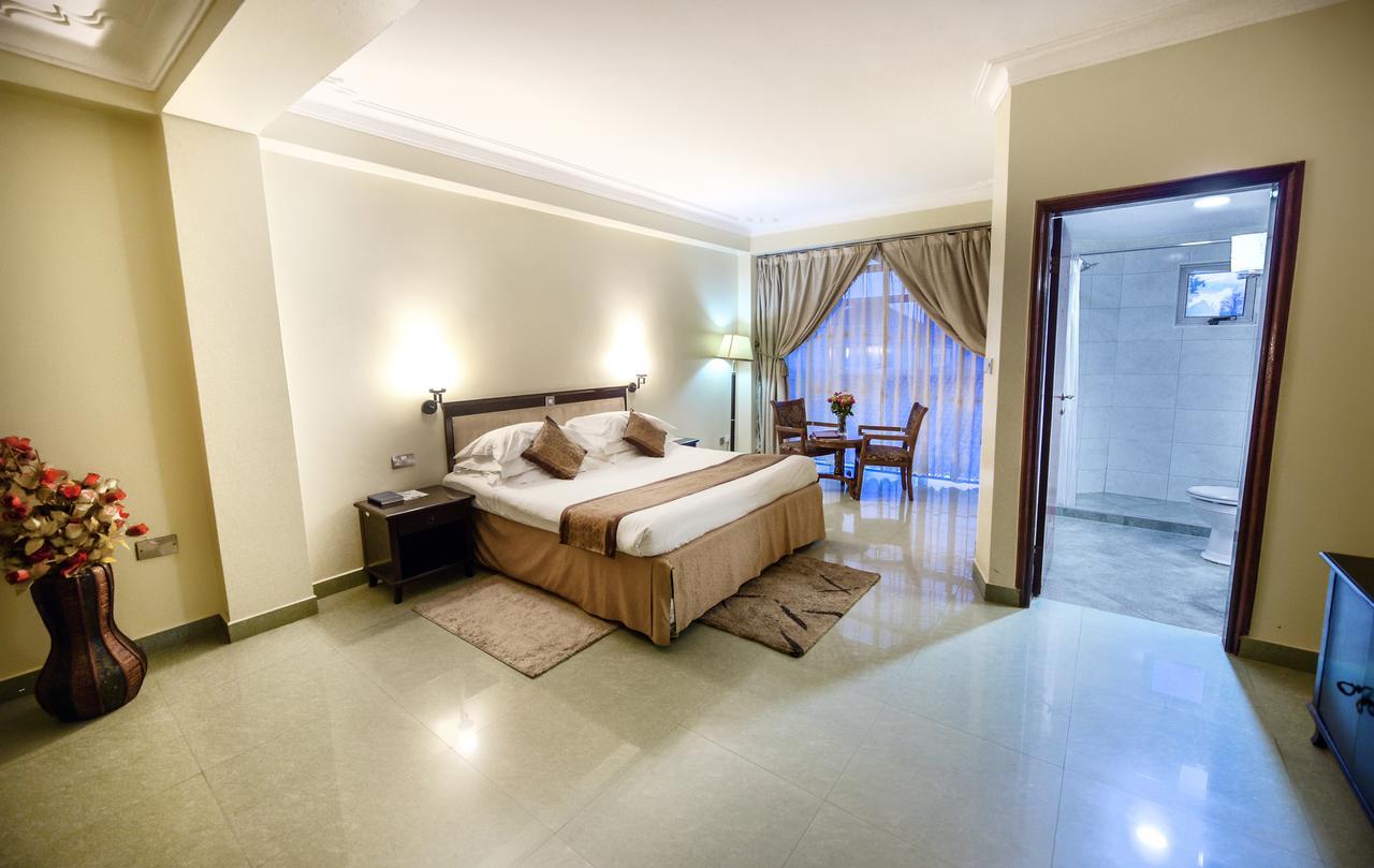 Hotel Sojovalo Кампала Экстерьер фото